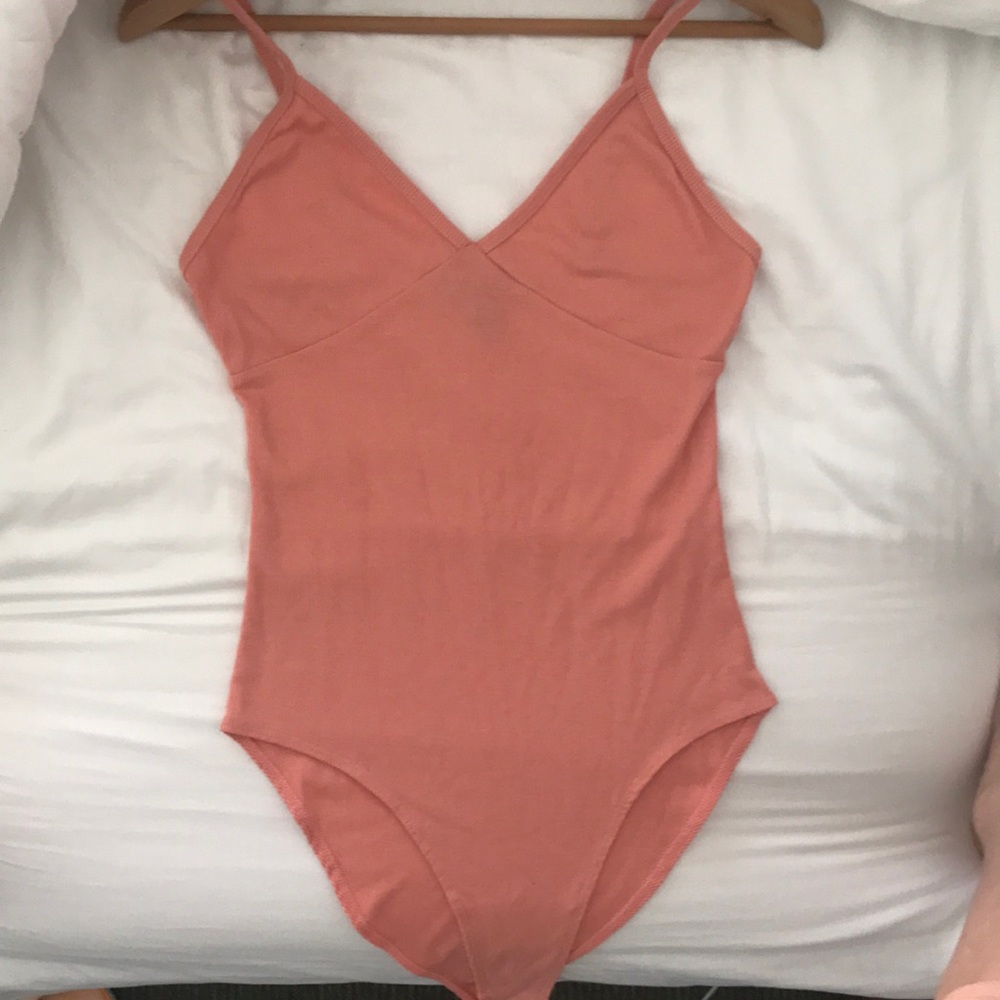 Peach coloured tank top body suit
